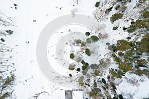 Picturesque landscape in the Altai mountains with snow-capped peaks under a blue sky with clouds in winter with gondola cableway