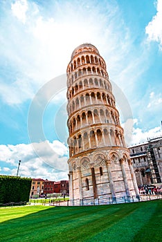 Picturesque landscape with church and famous sloping tower in Pisa, Italy. fascinating exotic amazing places