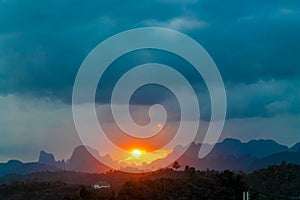 Picturesque landscape of mountains silhouette in Khao Sok tropical nature national park, Thailand