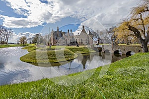 Picturesque landscape with Radboud castle surrounded by its moat in the background