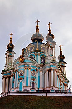 Picturesque landscape view of ancient Saint Andrew`s Church at the top of the hill. Cathedral built in the Baroque style