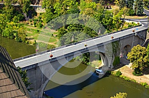 Picturesque landscape view of bridge over Ohre River to the medieval part of Loket town