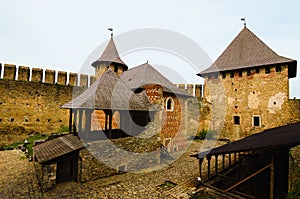 Picturesque landscape view of courtyard with ancient stone buildings in the medieval castle