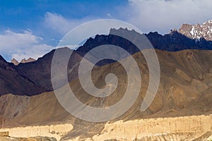 Picturesque lifeless mountain landscape on the Leh-Kargil route in the Himalayas in the vicinity of Buddhist monastery Lamayuru