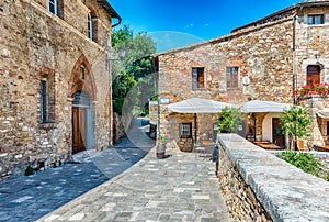 Picturesque medieval buildings in Bagno Vignoni, province of Siena, Italy photo