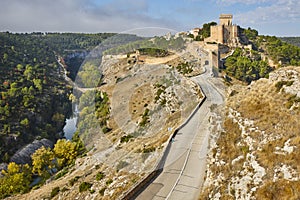 Picturesque medieval fortress village surrounded by nature in Spain. Alarcon photo