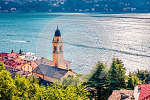 Picturesque morning cityscape of Laglio town with spire of S.Giorgio church, Province of Como, Lombardy region, Italy, Europe. Su
