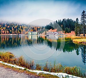 Picturesque morning scene of Misurina lake in National Park Tre Cime di Lavaredo. Colorful autumn view of Dolomite Alps, South