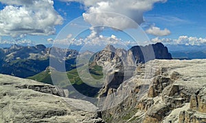Picturesque mountain landscape with mountain massif and clouds on background, Dolomites, Italy
