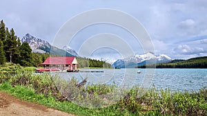 The picturesque mountain Maligne Lake in the Jasper National Park. Boat house on the lake.