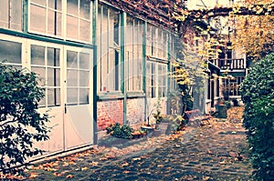 Picturesque parisian alley in autumn, Paris France