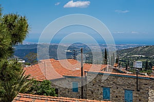 Picturesque photo of a valley on Cyprus. View to the Mediterranean Sea from the hill where the village Lefkara is. Cozy houses