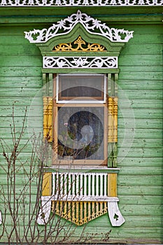 Picturesque platband on the window of an old Russian house
