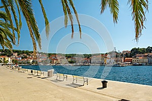 Picturesque promenade in the harbour of Mali on the island of Losinj in the Adriatic Sea, Croatia