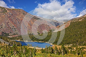 Picturesque red mountain on lake Tioga