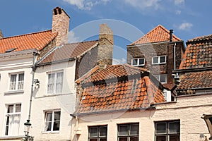 Picturesque red tiled roofs. Bruges. Belgium