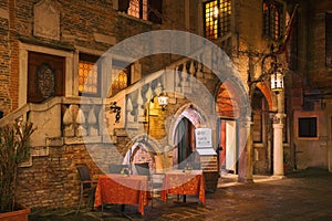 The picturesque restaurant in the evening light in Venice, Italy