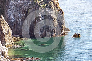 Picturesque rocks on the coast of Shkota Island in the vicinity of Vladivostok