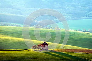 Picturesque rural landscape with old windmill