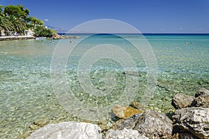 Picturesque sandy beach in village Ammoudi on the east coast of Zakynthos island, Greece.