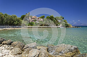 Picturesque sandy beach in village Ammoudi on the east coast of Zakynthos island, Greece.