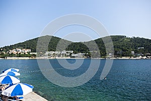 Picturesque scene across bay to Velika i Mala Petka, protected forests. Croatia