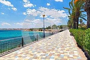 Picturesque seafront promenade of Punta Prima. Spain photo