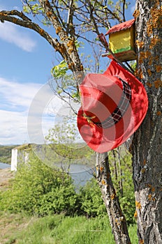 Picturesque spring landscape view of Pchelina Dam in Bulgaria with a red cawboy hat photo