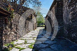 Picturesque streets with stone houses on the route of black villages Guadaljara, Majaelrayo. photo