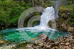 Picturesque Sum waterfall on Radovna river in the end of Vintar gorge, Slovenia