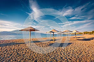 Picturesque summer day on Nafpaktos beach. Sunny morning seascape of Ionian sea