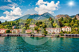 Picturesque summer view from ferry boat of Cadenabbia town. Bright morning scene of Como lake, Italy, Europe. Traveling concept ba