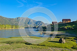 Picturesque sunset over mountain river in Altai