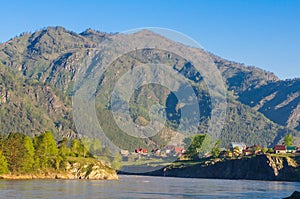 Picturesque sunset over mountain river in Altai