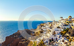 Picturesque traditional villas and scenery of Oia town Santorini Greece