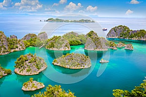 Picturesque tropical lagoon of  islands with reef coastline  and turquoise water