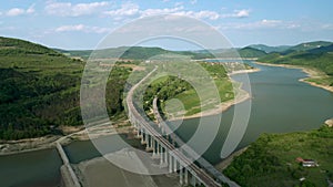 A picturesque valley with a drying dam and bridges