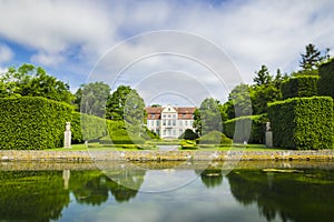 Picturesque view on abbots palace in Oliwa park in Gdansk