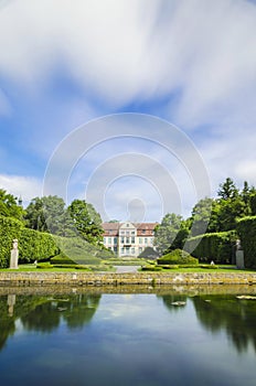 Picturesque view on abbots palace in Oliwa park in Gdansk, Poland