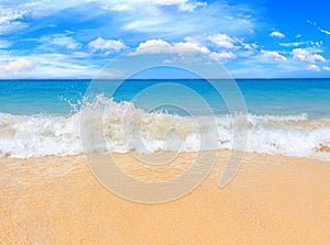 Picturesque view of Andaman sea with strong and high waves in Phuket island, Thailand. Tropical beach at the exotic island.