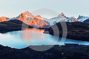 Picturesque view on Bachalpsee lake in Swiss Alps mountains