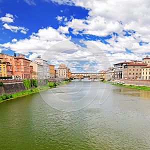 Picturesque view on colorful Ponte Vecchio over Arno River in Florence, Italy