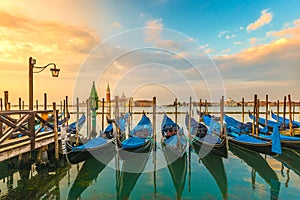 Picturesque view famous gondolas sunrise Venice Italy