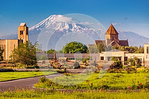 Picturesque view of famous Mount Ararat and the church of St. Gayane in the foreground. Travel and tourist attractions in