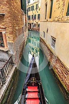 Picturesque view of Gondolas on lateral narrow Canal, Venice, Italy.