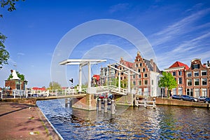 Picturesque View of Harlem Sight With Gravestenenbrug Bridge on Spaarne River On The Background At Noon