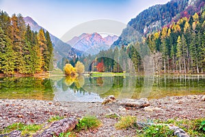 Picturesque view  of  lake Plansar Lake or Plansarsko jezero on valley Zgornje Jezersko in autumn