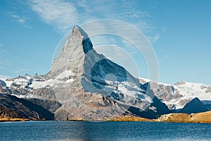 Picturesque view of Matterhorn peak and Stellisee lake in Swiss Alps