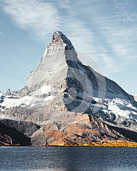 Picturesque view of Matterhorn peak and Stellisee lake in Swiss Alps