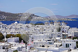 Picturesque view of Mykonos Island with whitewashed houses and windmills, Greece